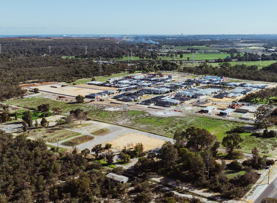 Aerial view of land development in Anketell, showcasing residential construction progress and natural surroundings—Catena Estate shaping Perth’s future living