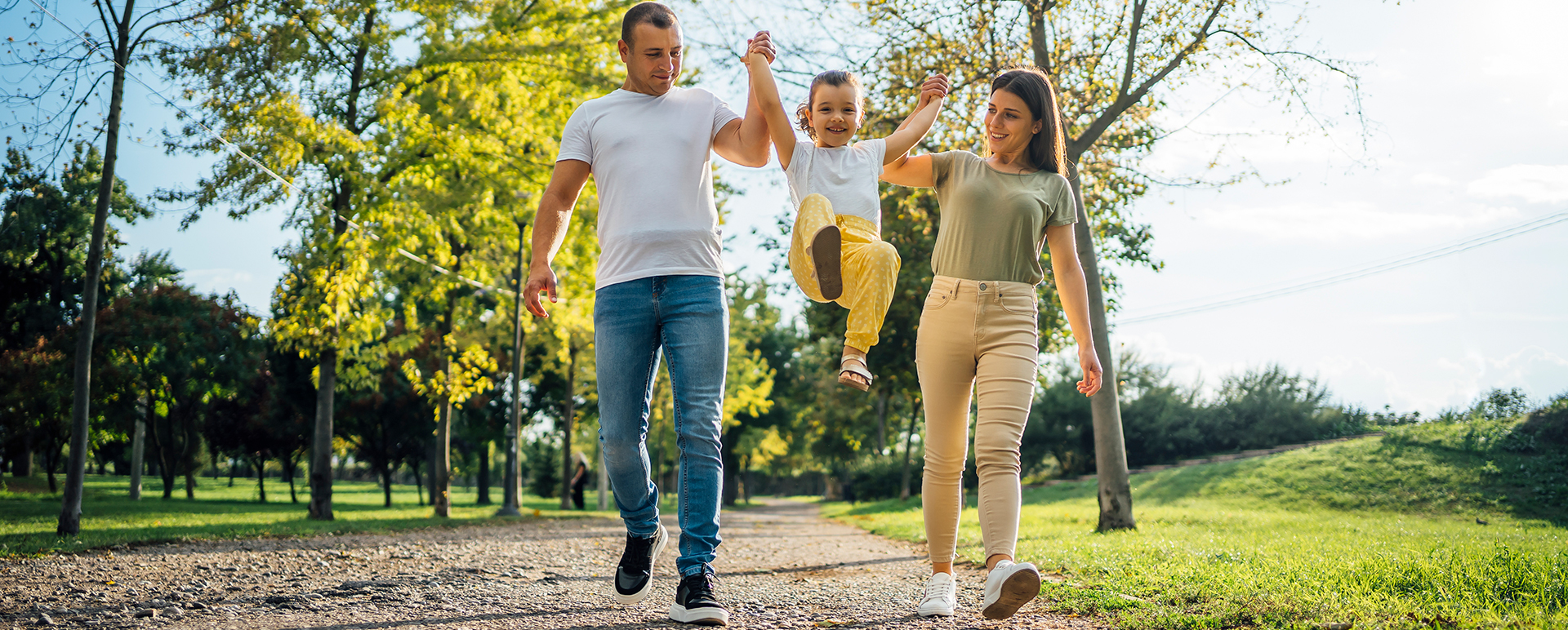 Happy family enjoying a walk in a scenic park in Anketell, Australia. Perfect lifestyle for families looking for a peaceful community at Catena Estate